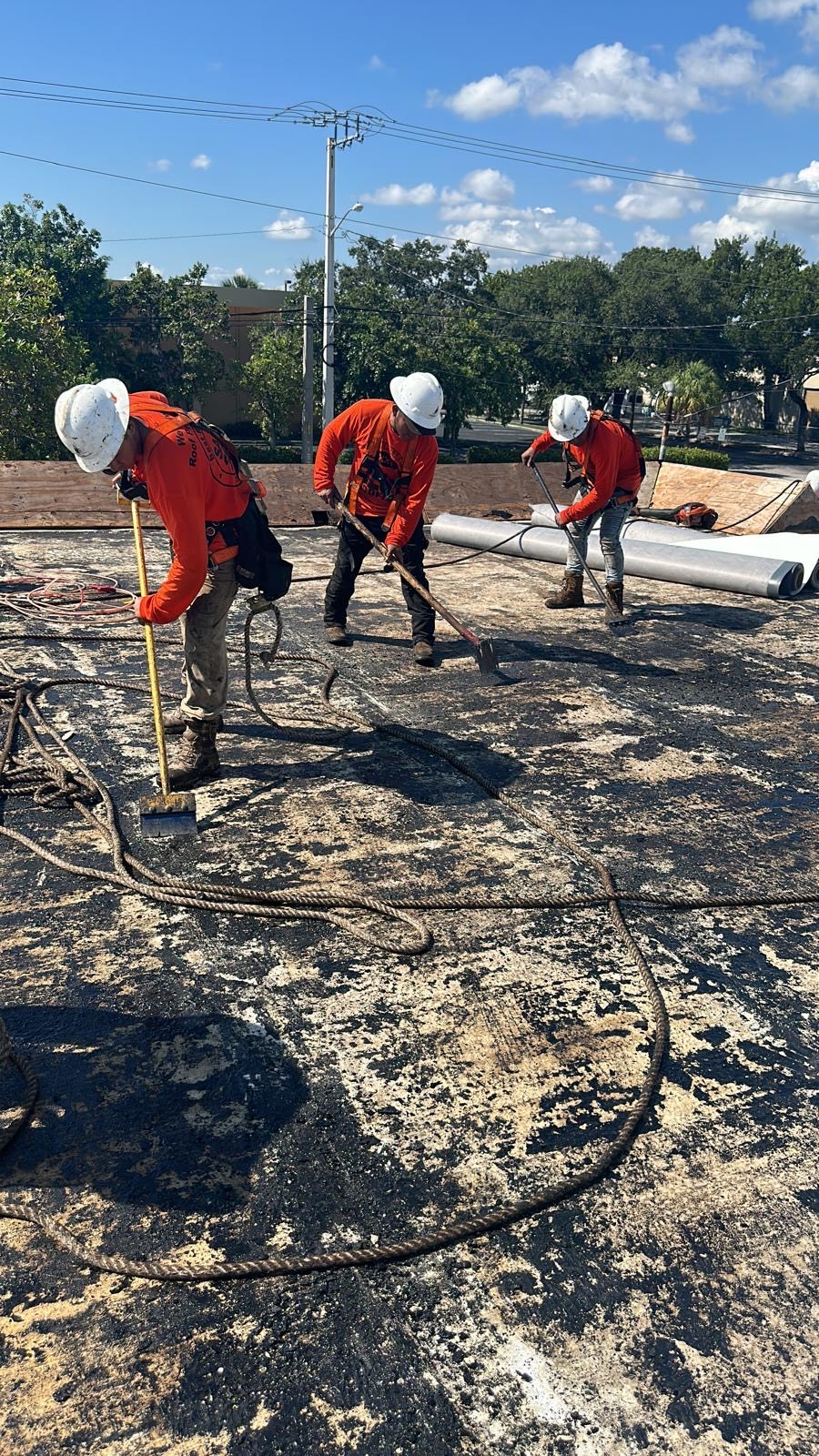Commercial roof tear-off in progress in South Florida