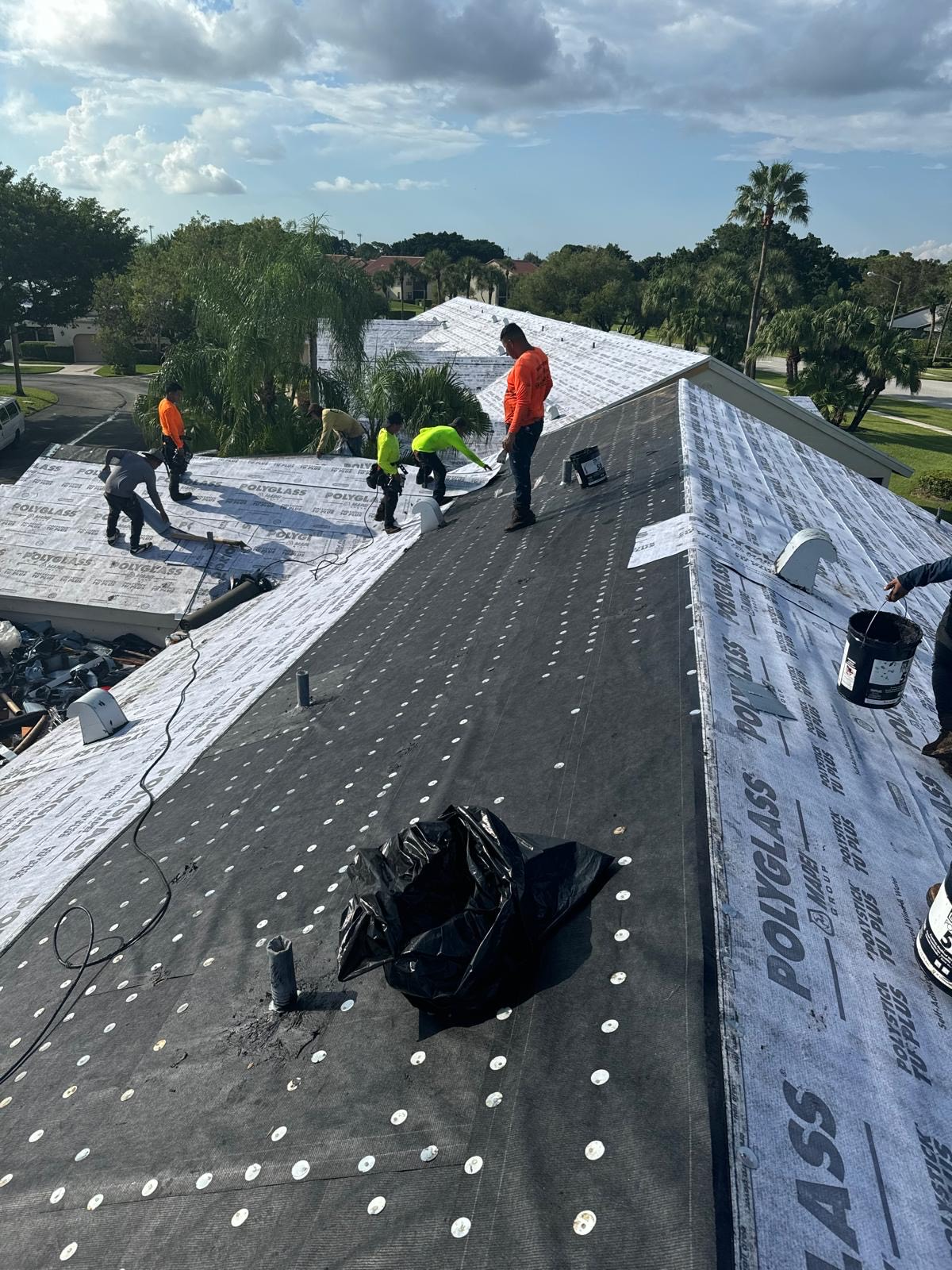 Residential flat roof coating installation