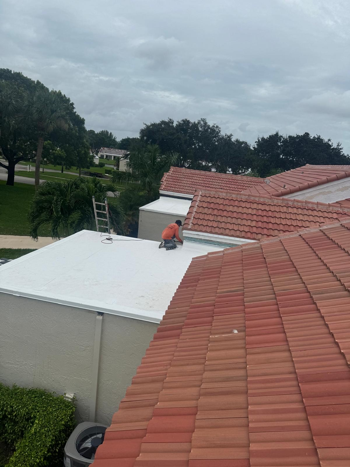Residential tile to flat roof transition